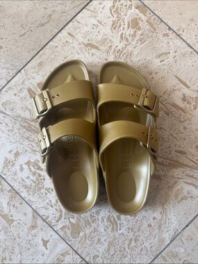Birkenstock Two-Strap Arizona EVA Sandals in Metallic Olive Gold Size 38